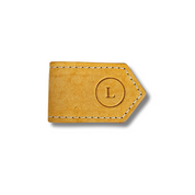 Back view of leather bookmarks in yellow with an embossed logo, smooth texture, rounded edges, fine stitching, and minimalist design. 