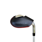 Studio shot of leather magnetic golf iron covers in black with red stitches neatly arranged to showcase their smooth texture, precise stitching, and minimalist design under soft lighting.