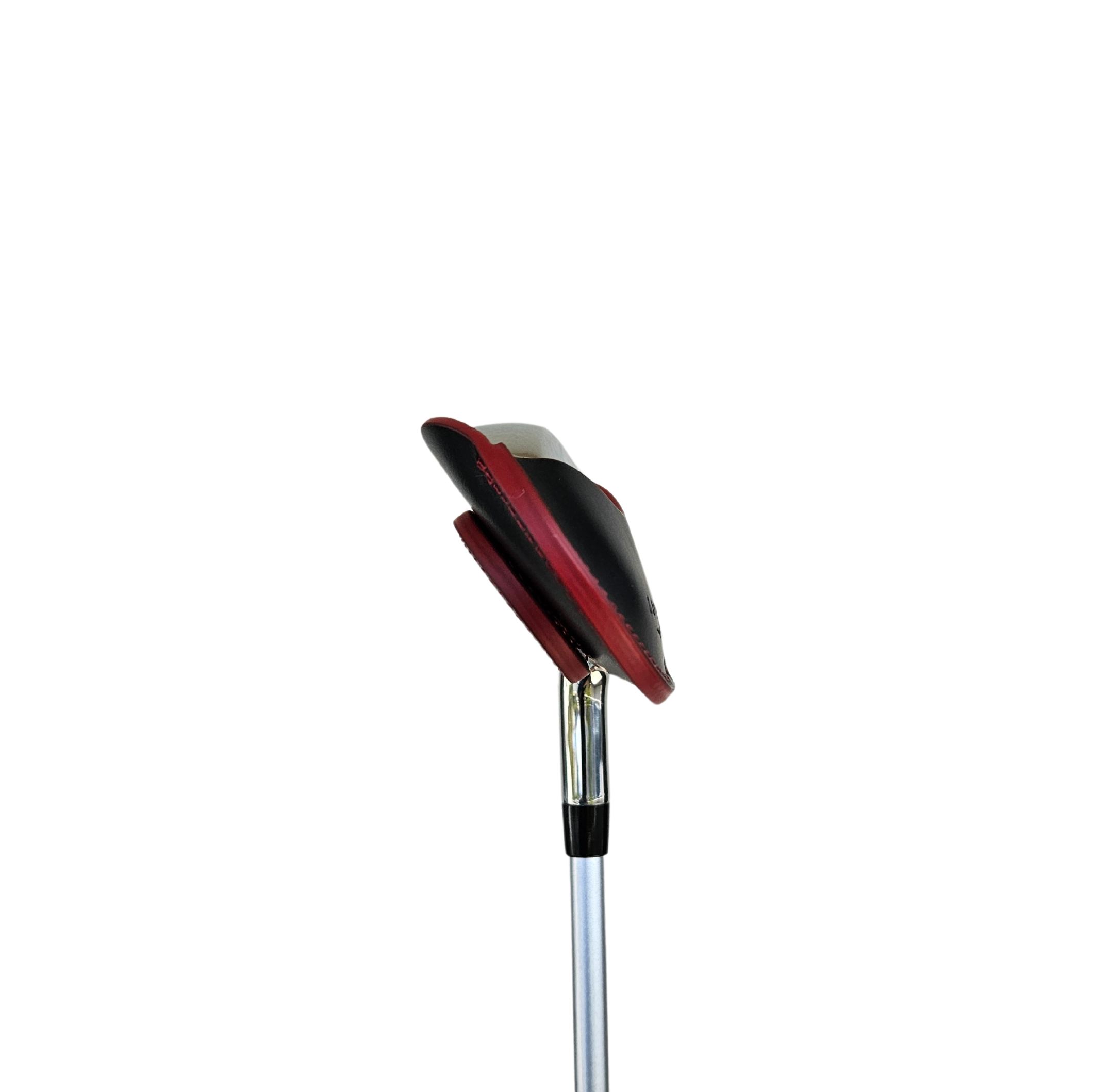 Studio shot of leather magnetic golf iron covers in black neatly arranged to showcase their smooth texture, precise stitching, and minimalist design under soft lighting.