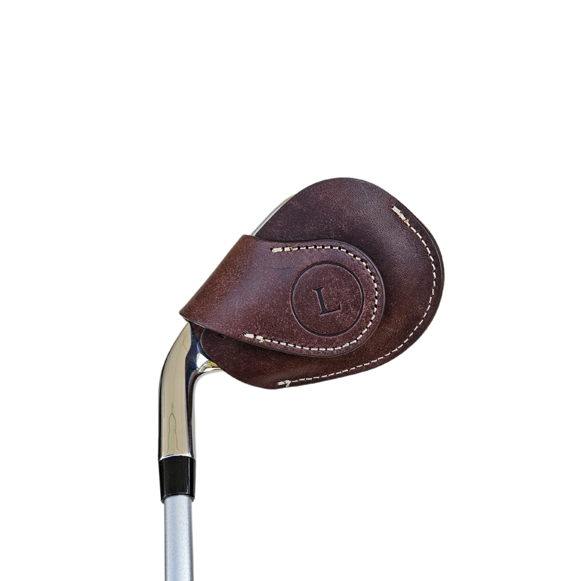 Studio shot of leather golf iron covers in brown neatly arranged to showcase their smooth texture, precise stitching, and minimalist design under soft lighting.