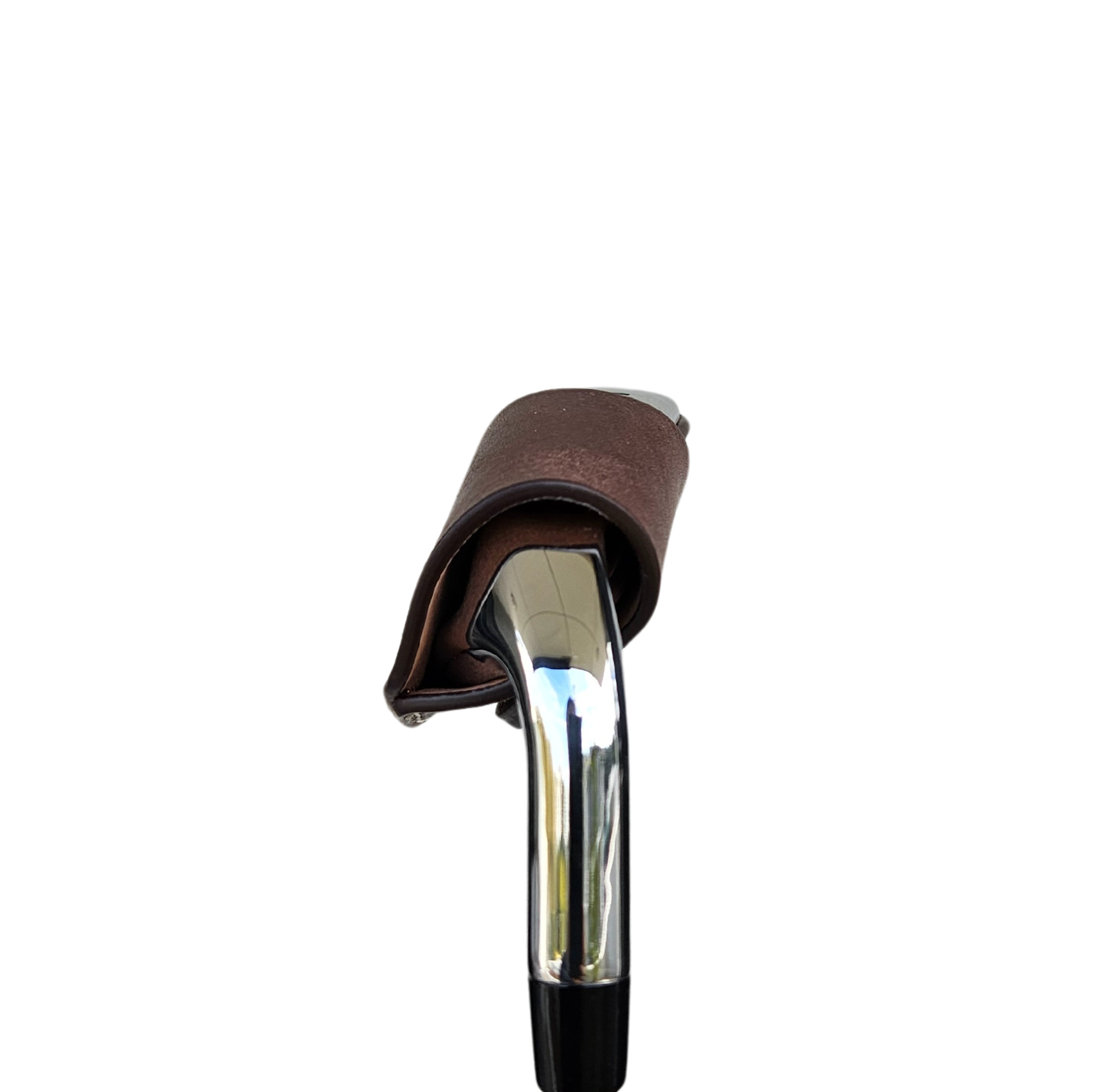 Studio shot of leather magnetic golf iron covers in brown neatly arranged to showcase their smooth texture, precise stitching, and minimalist design under soft lighting.